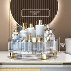Clear rotating desktop storage box with multiple compartments for organizing small items, shown from a side angle