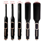 Negative ion flat iron gliding through dark hair, showing smooth and shiny straightened results