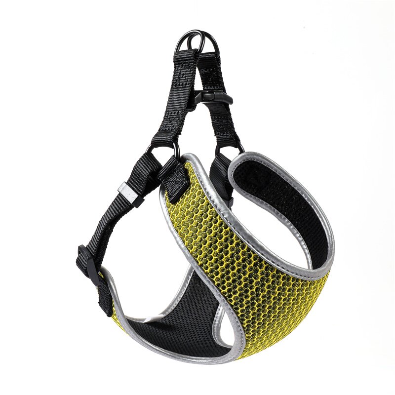 Small dog wearing a snug-fit vest harness in a neutral color, shown from the side to highlight the secure fit and soft fabric