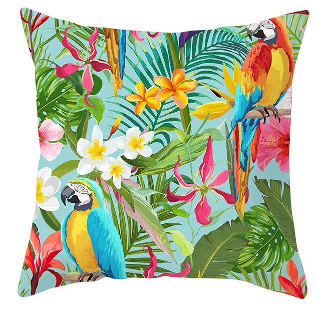 Tropical parrot and plant print throw pillow cover laid flat, showing vibrant botanical pattern on 45x45cm cushion cover