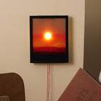 Sunset gradient levitating lamp glowing with warm amber and pink tones, floating above its base as a Tanabata ambient night l