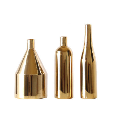 Gold-plated ceramic desktop vase with a glossy finish, shown as a modern decorative accent for home or office styling