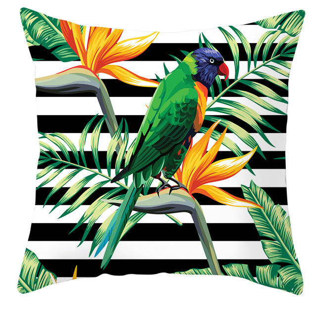 Tropical parrot and plant print throw pillow cover laid flat, showing vibrant botanical pattern on 45x45cm cushion cover