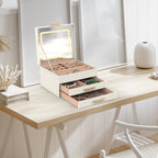 3-layer jewelry box organizer open to reveal LED mirror, ring slots, and necklace hooks inside