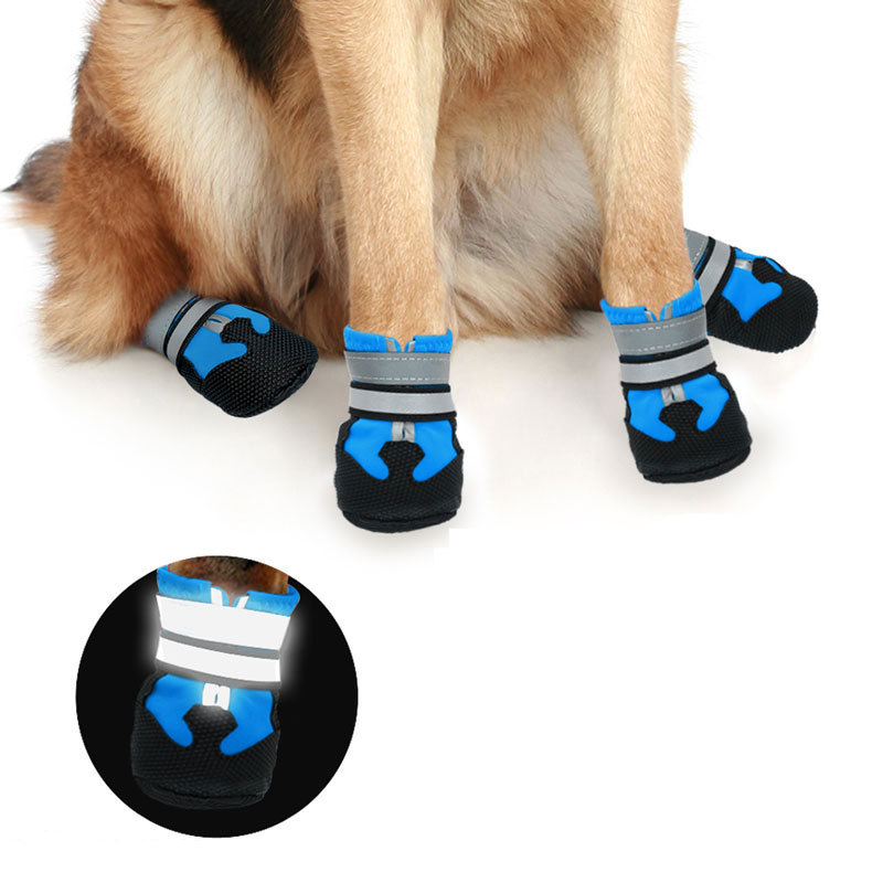 Water-resistant non-slip dog boots for medium and large dogs, shown in a set of four protective paw covers