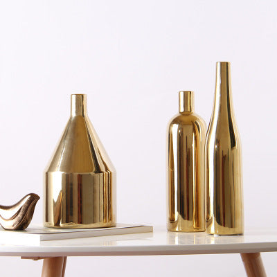 Gold-plated ceramic desktop vase with a glossy finish, shown as a modern decorative accent for home or office styling