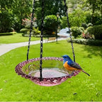 Hanging bird bath and feeder bowl with water, shown suspended outdoors in a garden setting