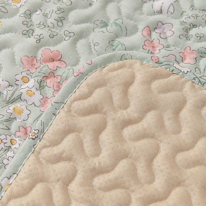 Folded pure cotton pet mat showing soft fabric texture and non-slip backing, suitable for cats, dogs, and rabbits