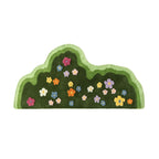 Soft area rug with floral and plant print pattern, shown flat with non-slip backing detail for home flooring use
