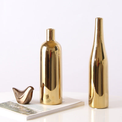 Gold-plated ceramic desktop vase with a modern glossy finish, shown as a decorative accent for home or office styling