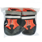 Close-up of water-resistant non-slip dog boots showing durable sole grip and secure strap closure for medium and large dogs