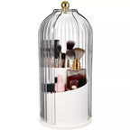 Clear acrylic 360 rotating makeup brush holder with lid open, showing organized compartments for brushes and beauty tools on 