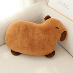 Soft plush capybara embroidered decorative pillow cushion shown from a side angle highlighting texture detail