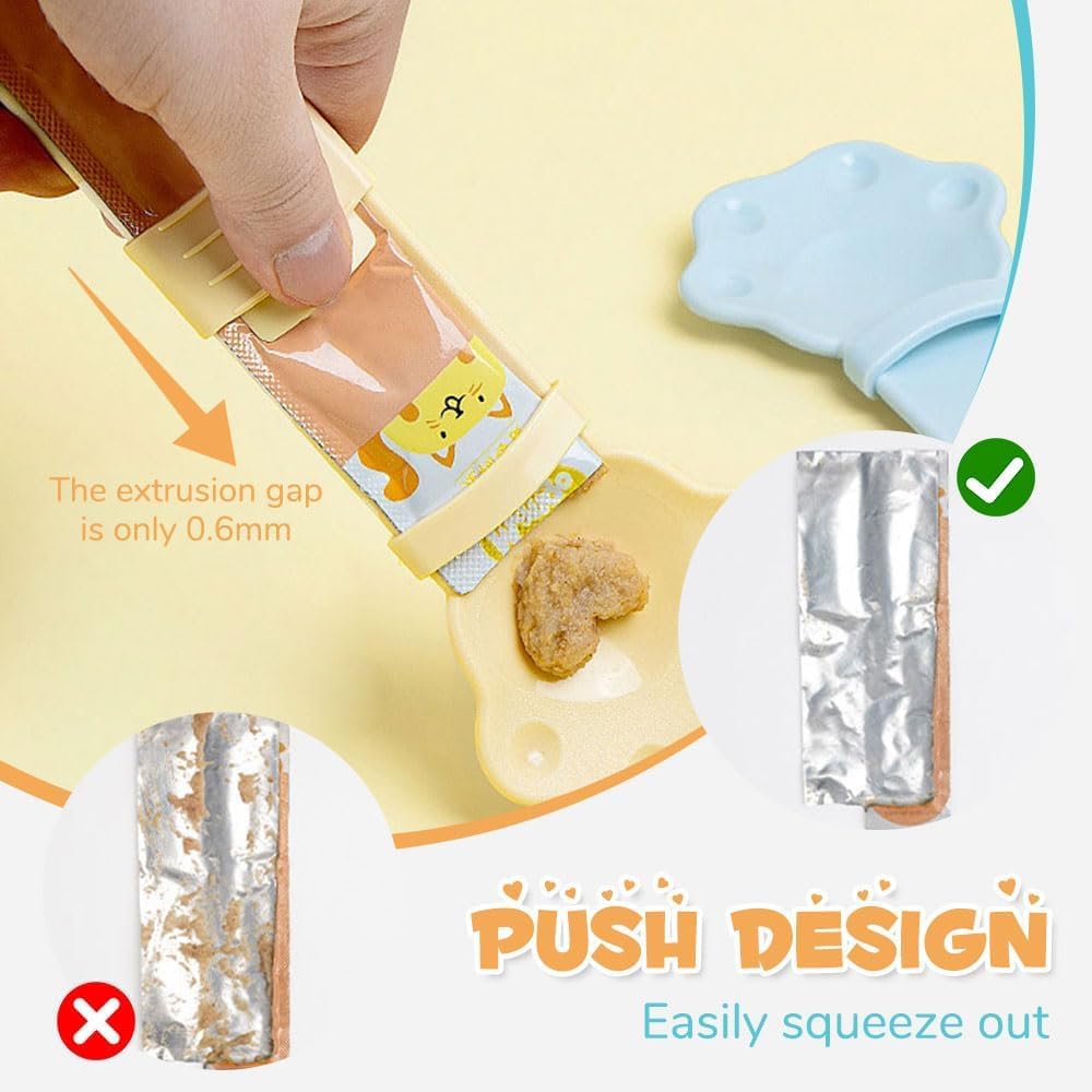 Cat treat squeeze spoon lickable feeder dispenser with soft silicone tip, shown in a close-up product view