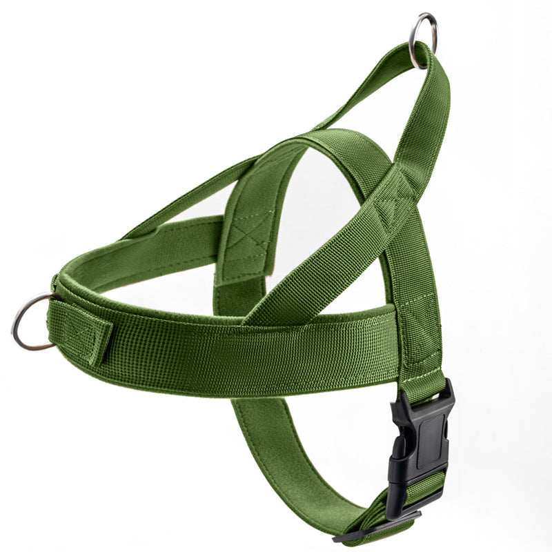 Black tactical dog vest harness with adjustable straps and collar, shown from a side angle highlighting the no-pull design