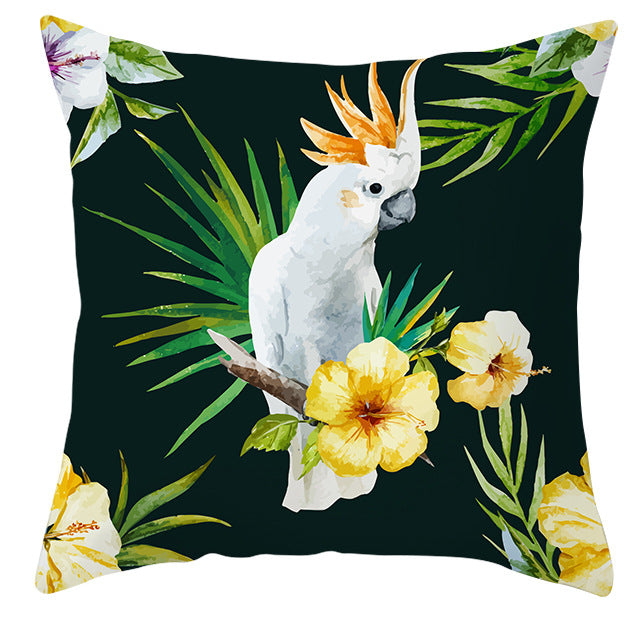 Tropical parrot and plant print throw pillow cover laid flat, showing vibrant botanical pattern on 45x45cm cushion cover