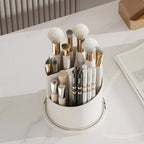 Clear acrylic 360 rotating makeup brush holder with lid open, showing organized compartments for brushes and beauty tools on 