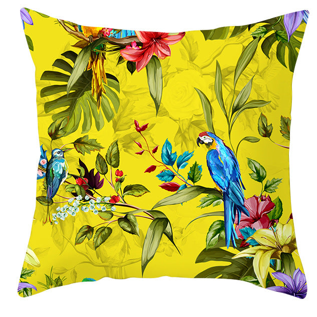 Tropical parrot and plant print throw pillow cover laid flat, showing vibrant botanical pattern on 45x45cm cushion cover