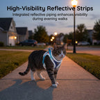 Gray adjustable step-in cat harness with matching leash laid flat on a white background