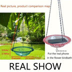 Hanging bird bath and feeder bowl suspended outdoors, showing underside detail and hanging chain for garden or yard use