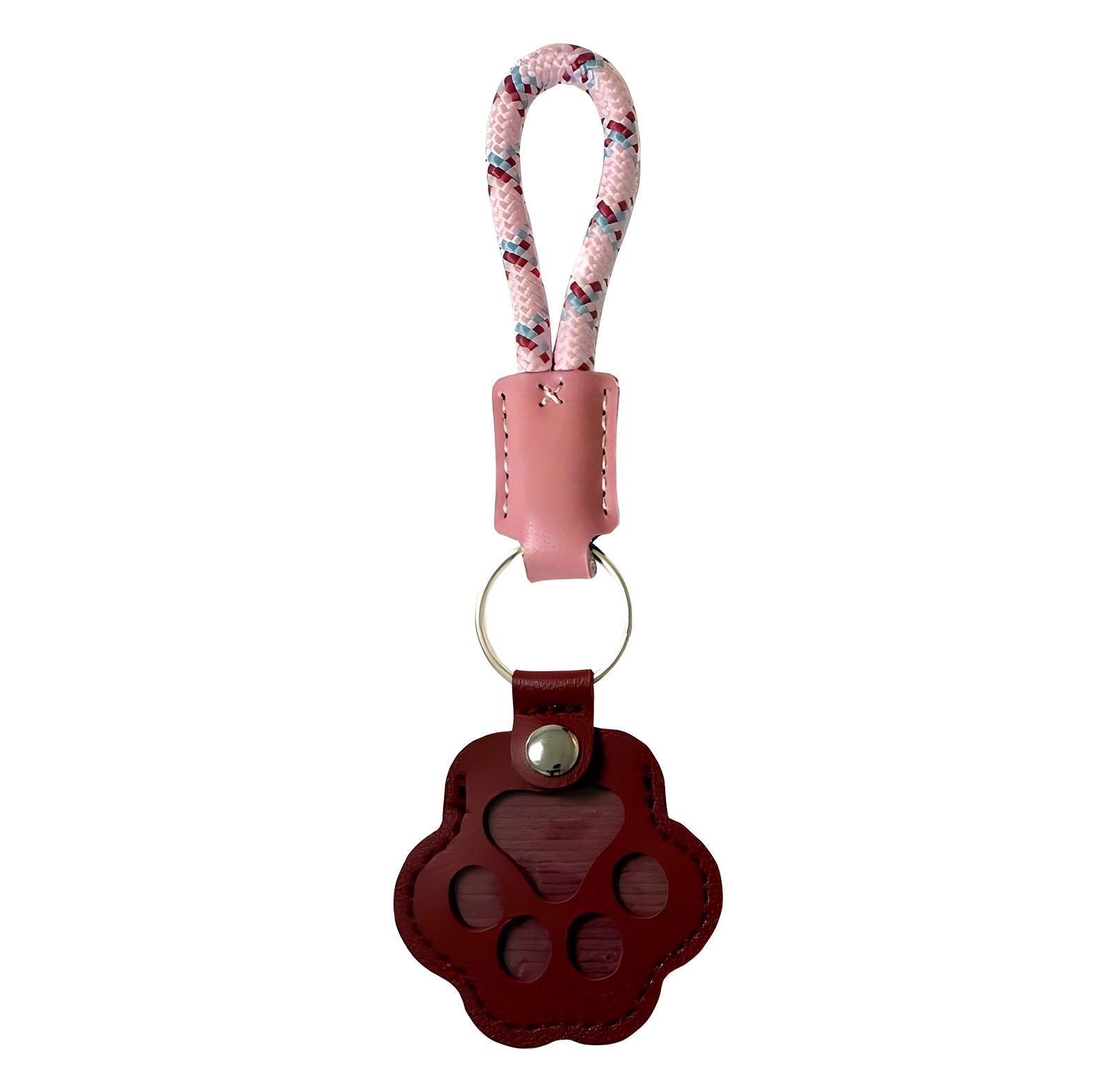 Paw-shaped brown leather keychain with a small window holding pet fur, a heartfelt memorial keepsake for dogs and cats