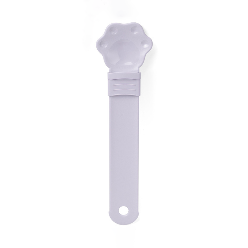 Cat treat squeeze spoon lickable feeder dispenser shown in multiple color options on a white background