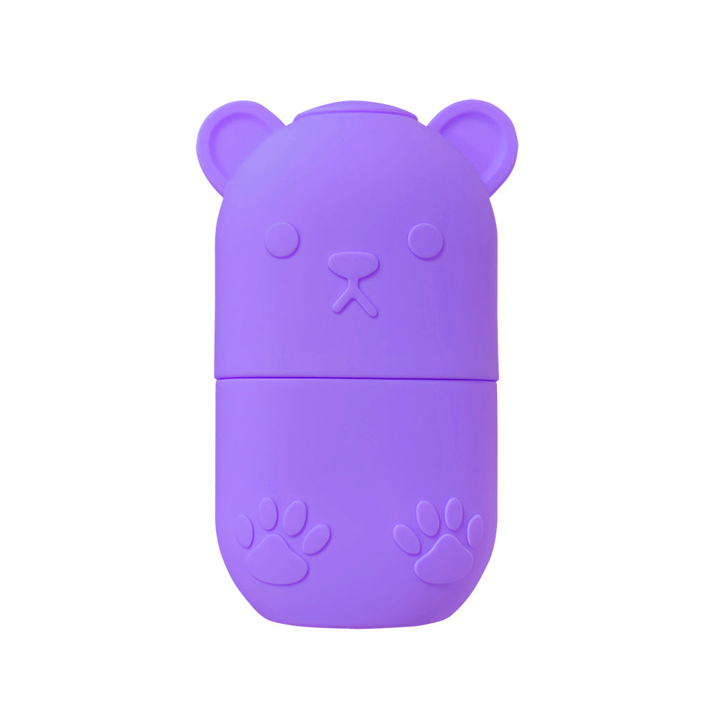 Silicone ice face roller held in hand, showing flexible bristle head design for facial massage and skin cooling