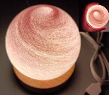 USB lantern night lamp casting a warm rainbow sunset glow on a table as ambient mood lighting