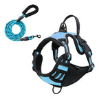 Gray reflective dog vest harness with attached chest-strap leash, shown from the side on a white background
