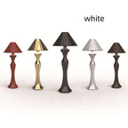 Minimalist LED desk lamp with built-in charging port shown from a side angle, highlighting its slim modern design for bedroom