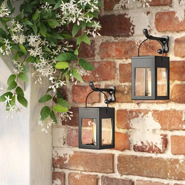 Matte black solar LED lantern path lights shown as a set of two, suitable for outdoor garden or walkway lighting