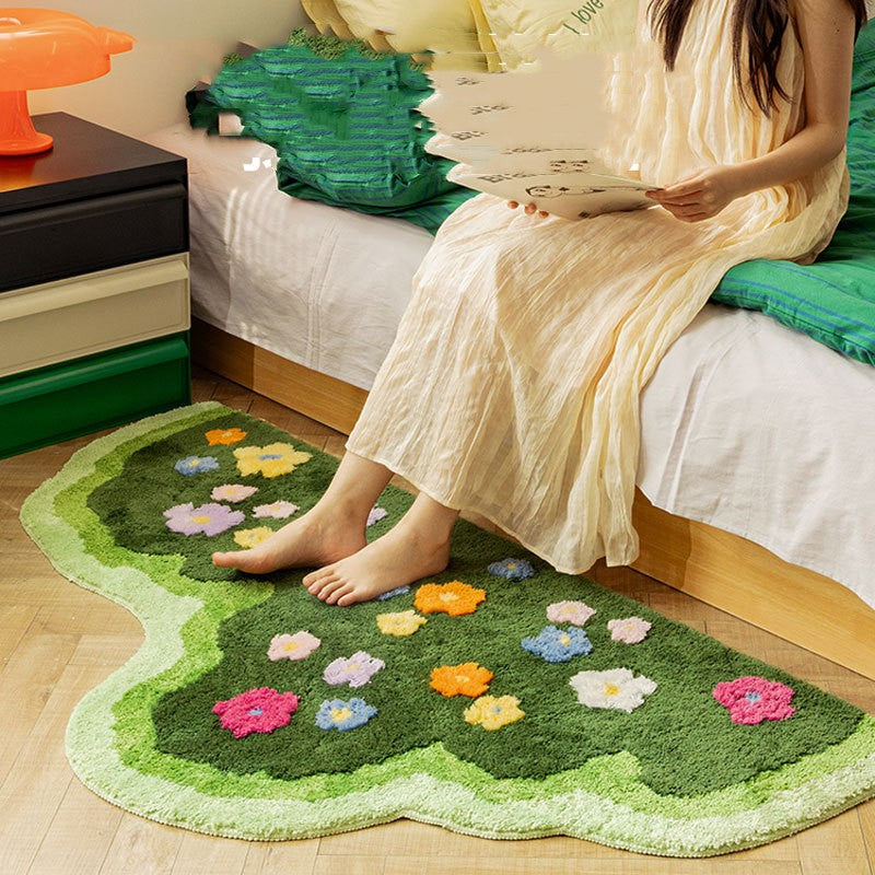 Soft area rug with floral and plant print pattern, shown flat with non-slip backing detail for home flooring