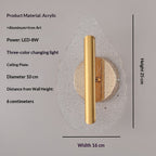 Modern minimalist leaf-shaped wall sconce glowing with warm tri-color LED light mounted on an interior wall