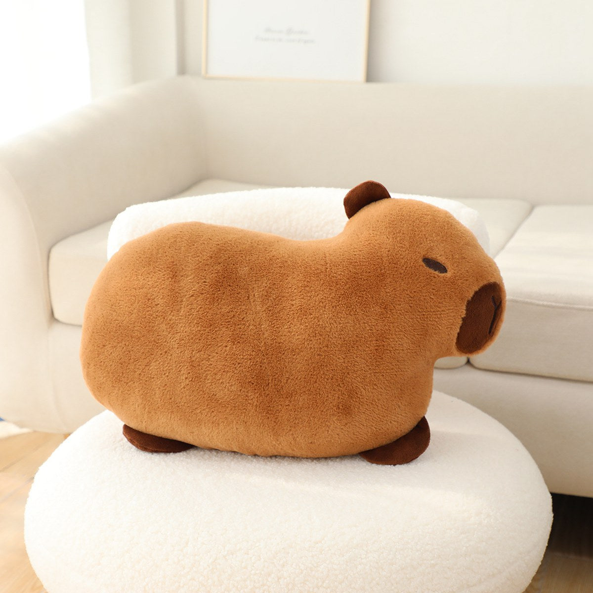 Soft capybara embroidered plush pillow cushion shown from the front, featuring detailed stitching on cozy fabric