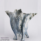 Handmade glazed ceramic vase with a smooth matte finish, styled as modern minimalist home decor on a neutral surface