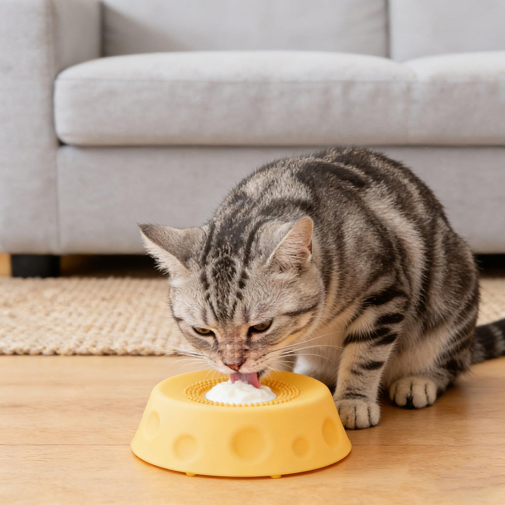 Light blue dog slow feeder lick bowl with rolling ball insert, designed to slow down eating and provide mental stimulation
