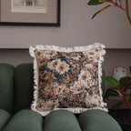 Jacquard floral throw pillow cover with decorative tassel fringe detail, shown in a close-up view of the textured woven patte