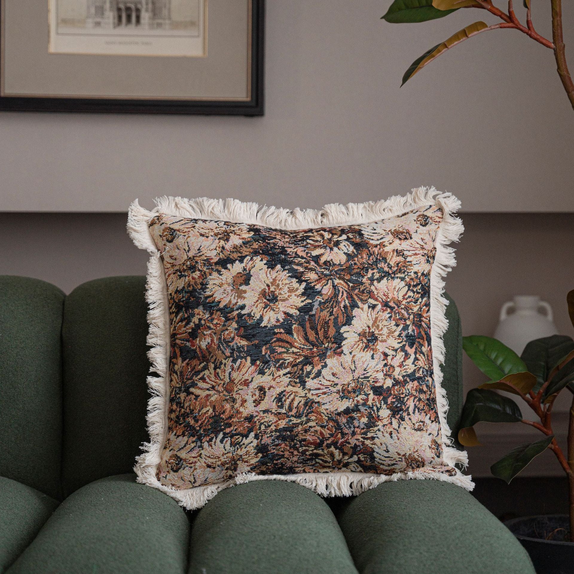 Jacquard floral throw pillow cover with decorative tassel fringe detail, shown in a close-up view of the textured woven patte