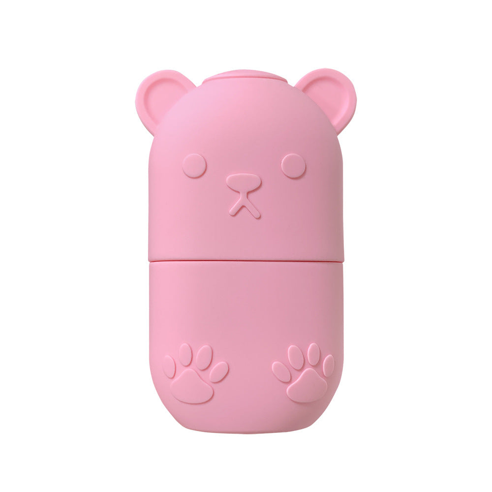 Pink silicone ice face roller for facial massage and skin care, shown close up highlighting textured rolling head