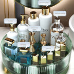 Clear rotating desktop storage box open to show multiple compartments for organizing small items like stationery and accessor