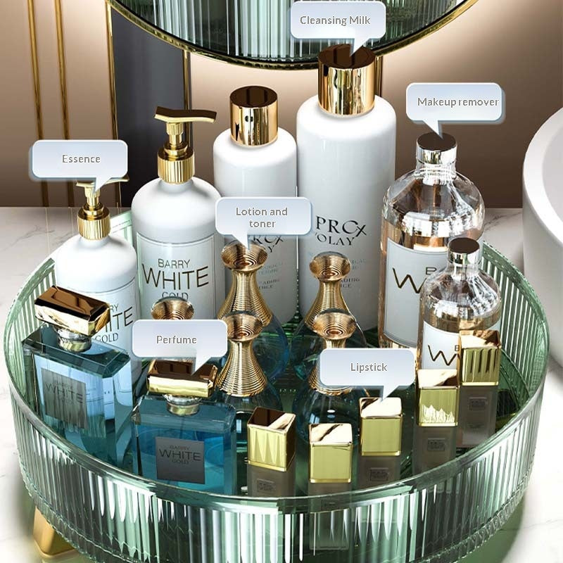 Clear rotating desktop storage box open to show multiple compartments for organizing small items like stationery and accessor