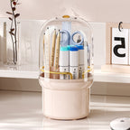 Clear rotating makeup brush holder with dustproof lid, showing organized brushes stored upright in a 1L acrylic canister