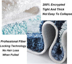 Fluffy wave-shaped bath mat in soft plush fabric, shown flat with textured surface detail for a cozy bathroom rug look