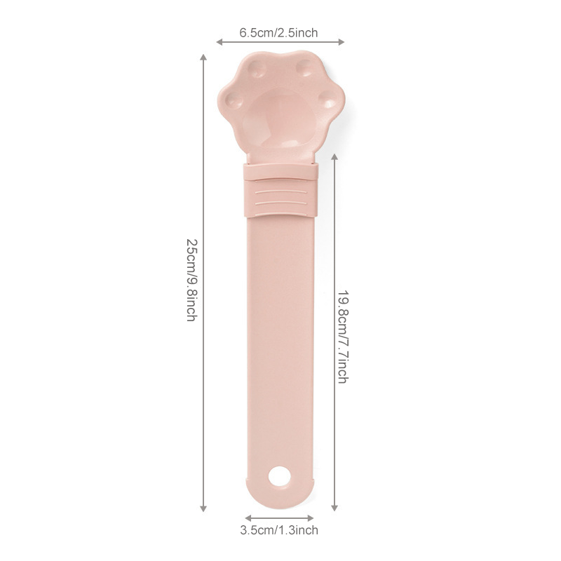 Cat treat squeeze spoon with lickable feeder tip, shown in a close-up view ideal for dispensing soft cat treats