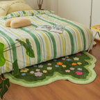 Soft area rug with floral and plant print pattern, shown flat with non-slip backing detail for home flooring