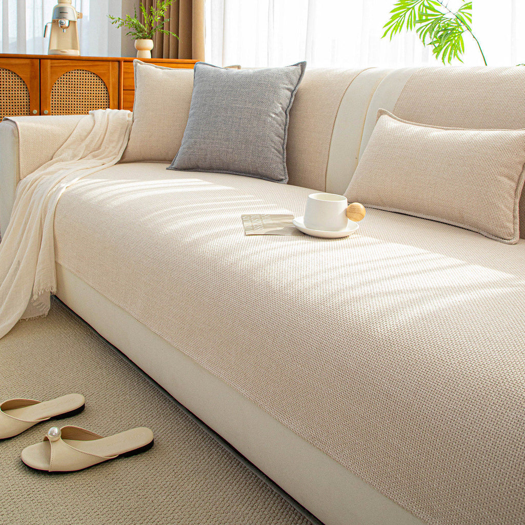 Close-up of a Japanese-style faux cotton-linen sofa cushion cover showing textured fabric detail in a neutral tone