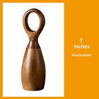 Desert ironwood pepper mill standing upright, showcasing natural wood grain texture with a manual ceramic grinder mechanism