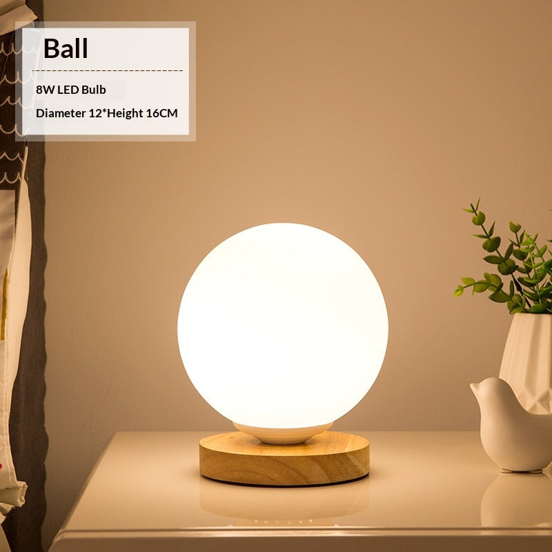 Solid wood table lamp with a Nordic minimalist design, shown as a modern desk light accent for home or office