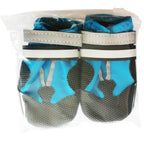 Close-up of water-resistant non-slip dog boots showing durable sole grip and secure strap closure for medium and large dogs