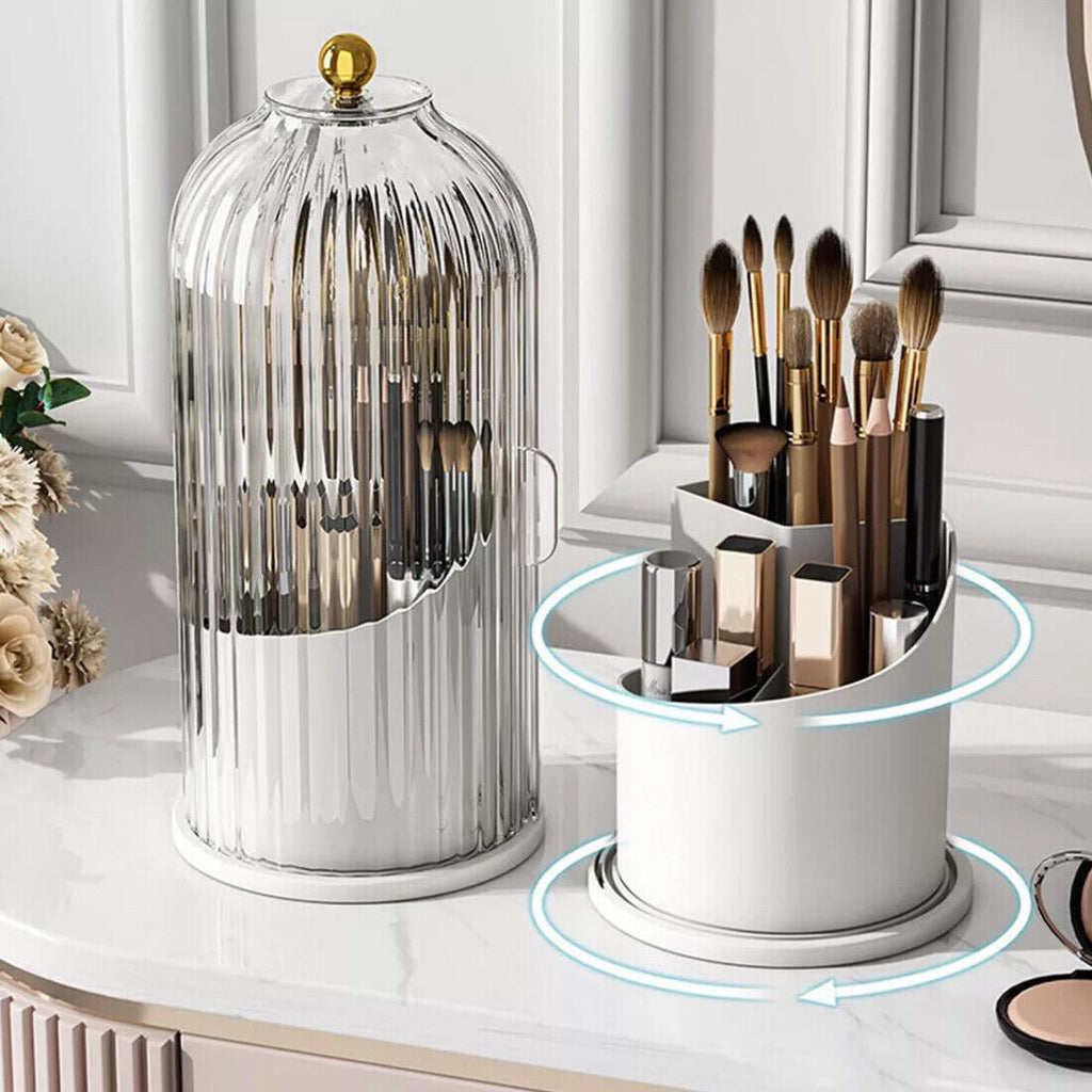 Clear acrylic 360 rotating makeup brush holder with lid, shown open on a desktop with brushes and beauty tools organized insi